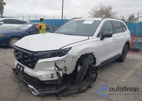 2023 Honda Cr-V Hybrid Sport Touring z USA, uszkodzony, nr VIN 5J6RS6H9XPL008181